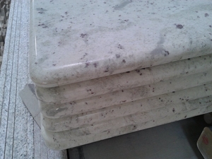 memoles andromeda countertops granit putih dengan backsplash